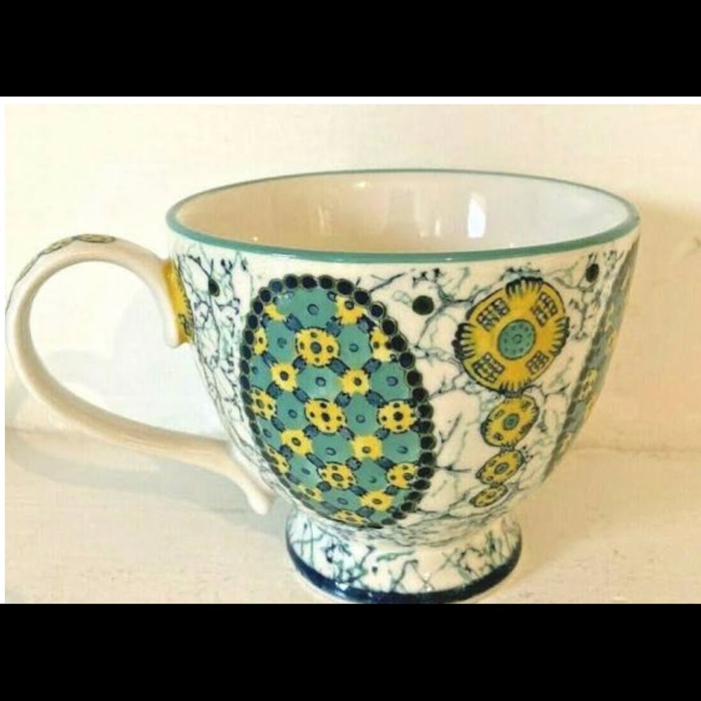 Anthropologie footed ceramic coffee mug Ornate  crest green and yellow